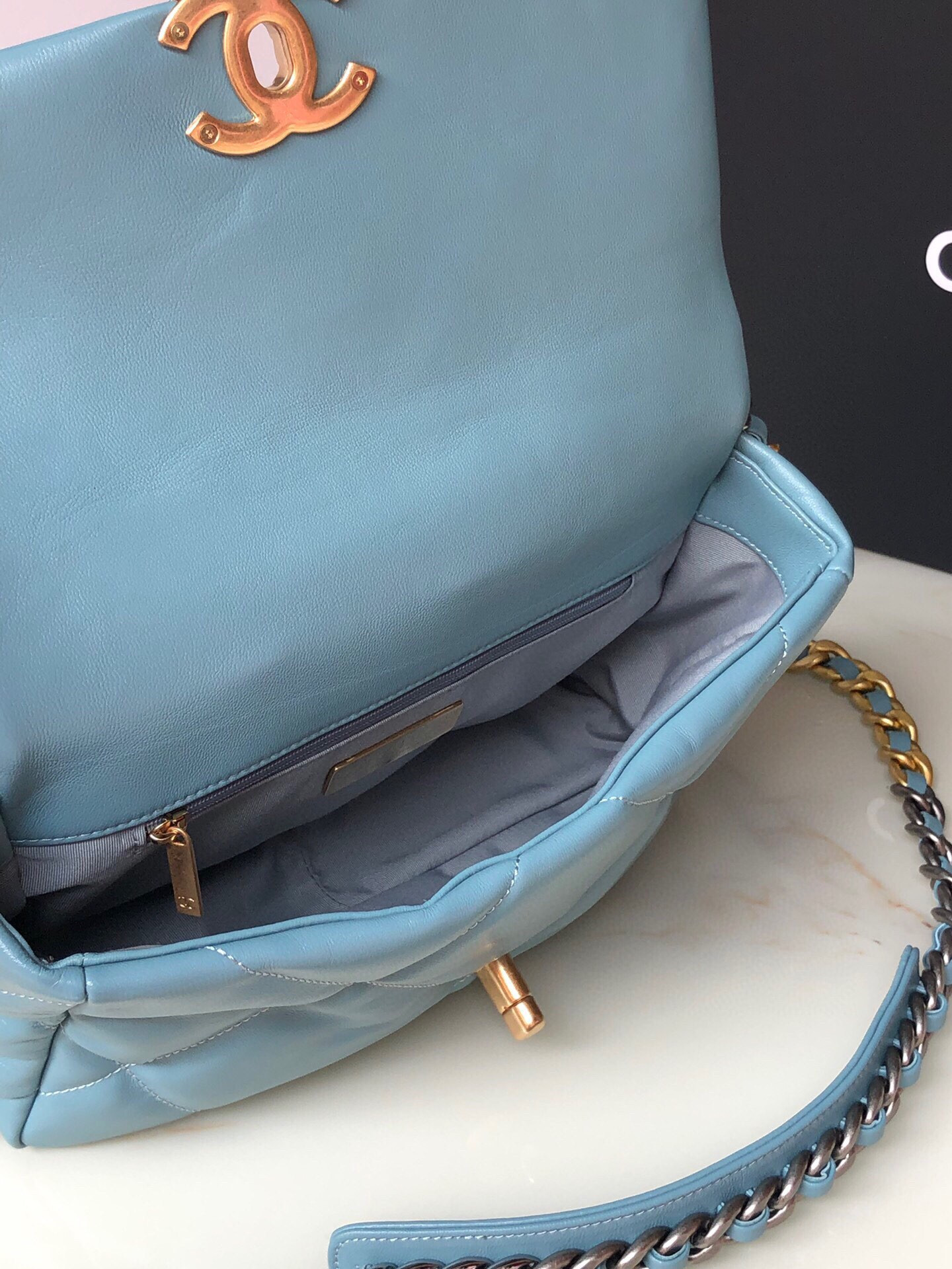 Ch*el 19 handbag shiny leather, gold-tone, silver-tone & ruthenium-finish metal blue 6.2 × 10.1 × 3.5 in