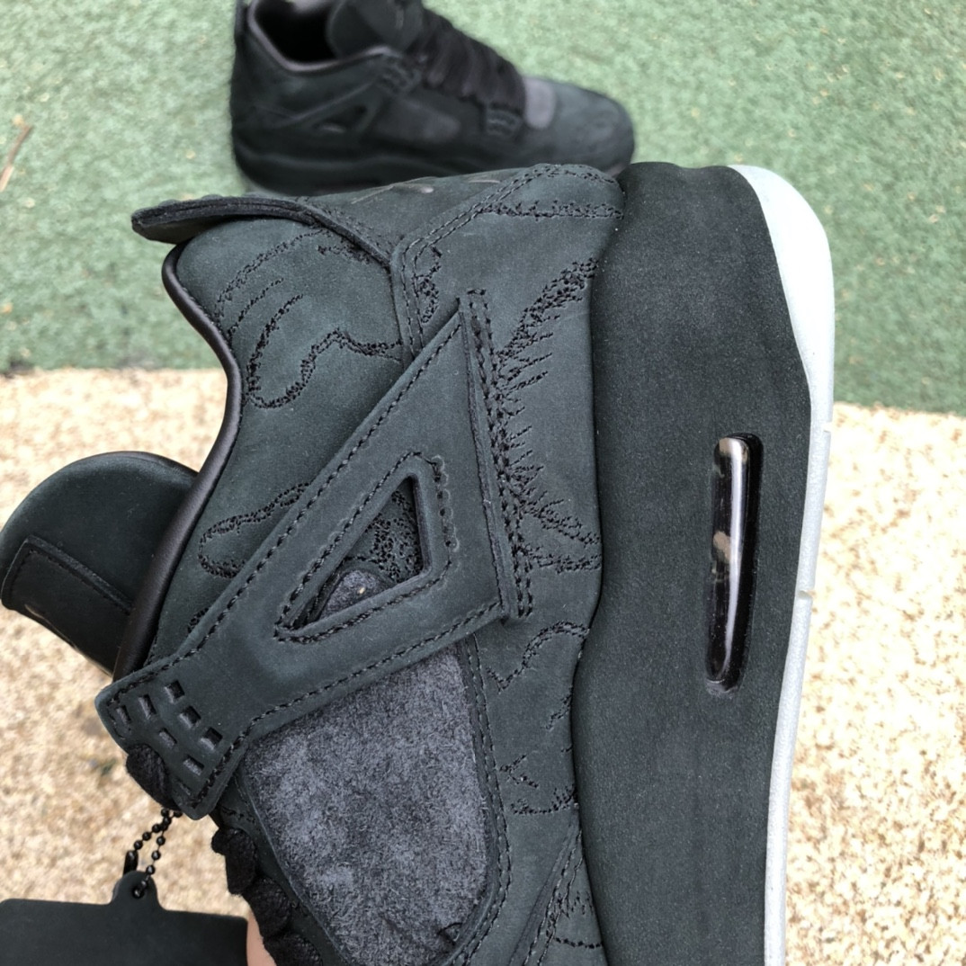 UA Jordan 4 Retro Kaws Black